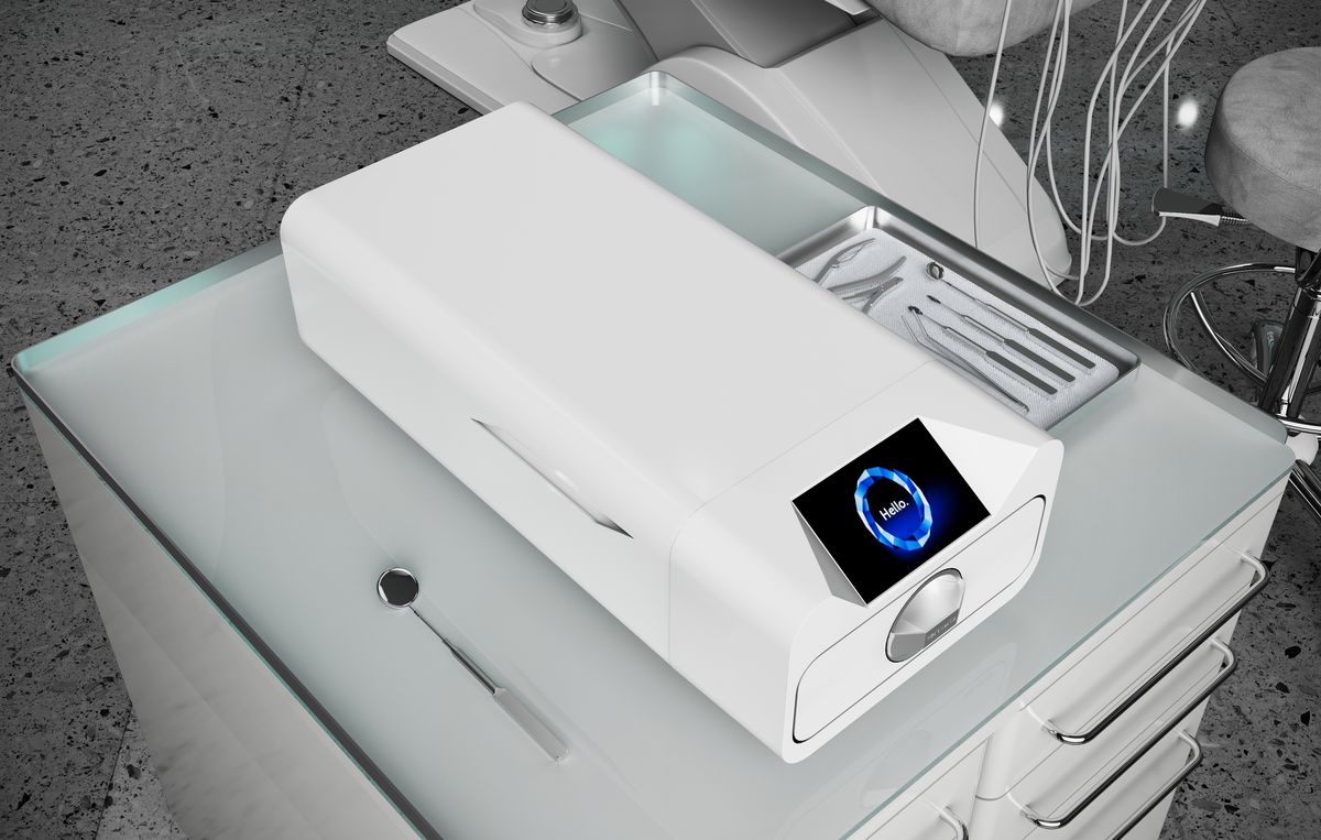 Vista cenital del Enbio S en un carro de gabinete dental con instrumental